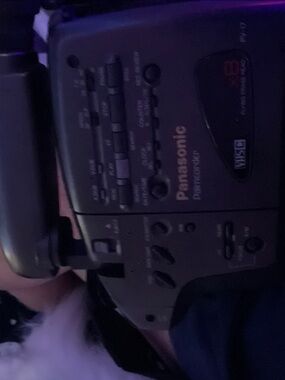 Panasonic pv17 palmcorder\Camcorder in Black with Purple Lighting